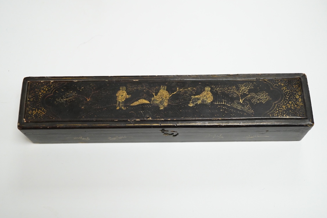 Four 19th century Chinese gilt-decorated black lacquer fans with figure painted leaves, two cased, largest 41cm